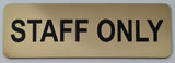 Gold 'STAFF ONLY' sign with Black text on a white background