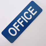 Blue sign with 'OFFICE' text on a white background