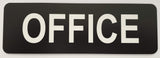 Black sign with 'OFFICE' in white on a light gray background
