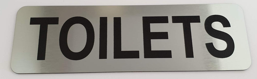 Silver sign with Black 'TOILETS' text