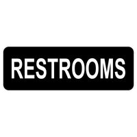 Black rectangular sign with White text 'RESTROOMS'