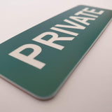 Ever Green sign with White 'PRIVATE' text on a white background