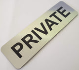 Silver 'PRIVATE' sign with Black text
