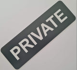 Rectangular sign with White 'PRIVATE' text on a Smoke Grey background