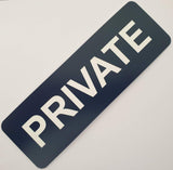 Navy sign with 'PRIVATE' in white on a light gray background