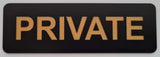 Black sign with 'PRIVATE' in gold on a light gray background