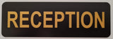 Black acrylic sign with Gold engraved text 'RECEPTION'