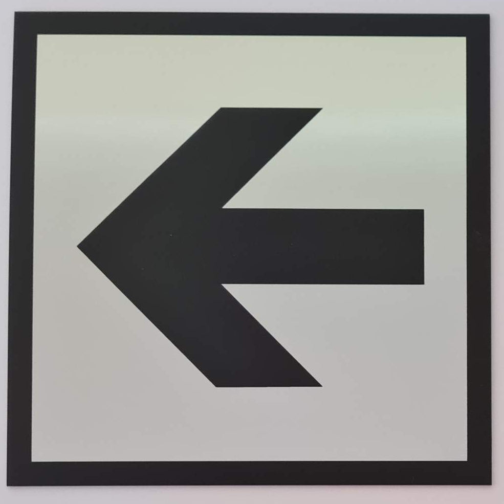 Black arrow symbol on a Silver background