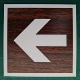English Walnut acrylic sign with a White engraved directional arrow