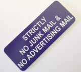 Purple acrylic sign with White engraved text