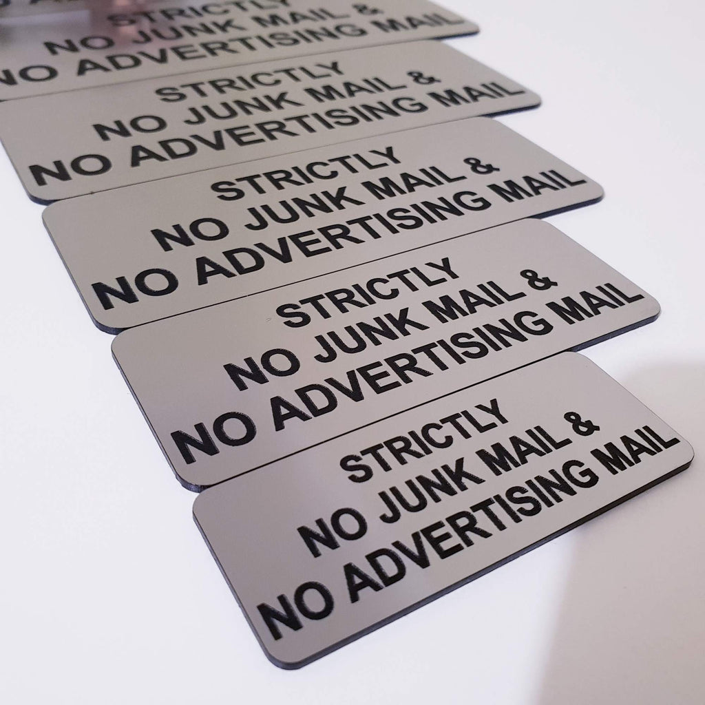 Silver acrylic sign with Black Engraved text "STRICTLY NO JUNK MAIL & NO ADVERTISING MAIL"