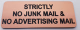 Rectangular Copper acrylic sign with black engraved text on a beige background