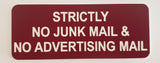 Burgundy acrylic sign with White engraved text