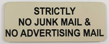 Almond acrylic sign with black engraved text 'Strictly No Junk Mail & No Advertising Mail' on a light gray background