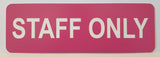 Pink sign with White text 'STAFF ONLY' on a white background