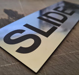 SLIDE WITH RIGHT ARROW GRAPHIC Sign / Plaque