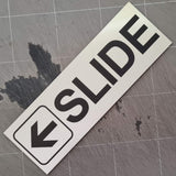 SLIDE WITH LEFT ARROW GRAPHIC Sign / Plaque