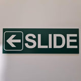 SLIDE WITH LEFT ARROW GRAPHIC Sign / Plaque