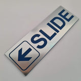 SLIDE WITH LEFT ARROW GRAPHIC Sign / Plaque