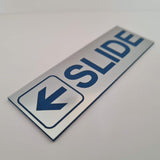 SLIDE WITH LEFT ARROW GRAPHIC Sign / Plaque