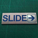 SLIDE WITH RIGHT ARROW GRAPHIC Sign / Plaque