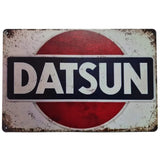 Vintage Datsun logo on a red and white background