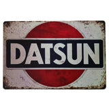 Rustic Datsun sign with red circle and white text on a white background