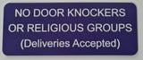 Rectangular sign with text on a plain background