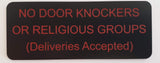 Black sign with red text on a white background