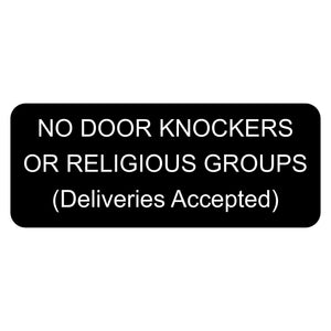 Black sign with white text on a white background