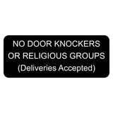 Black sign with white text on a white background