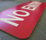 Red 'NO ENTRY' sign with white text
