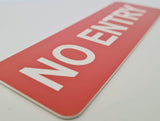 Orange 'NO ENTRY' sign with white text