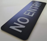 Black sign with Silver Text 'No Entry'