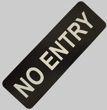 Black sign with white text 'NO ENTRY'