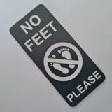 Smoke Grey acrylic sign with 'No Feet Please' text and symbol engraved in a White colour