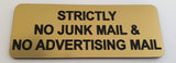 Gold acrylic sign sign with black engraved text 'Strictly No Junk Mail & No Advertising Mail' on a white background