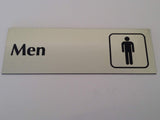 Silver acrylic Men's restroom sign with black engraved icon on a plain background