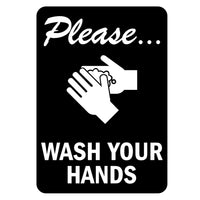 Black engraved acrylic sign with white text and icon instructing to wash hands