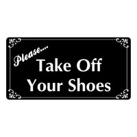 Black acrylic sign with white engraved text 'Please... Take Off Your Shoes' on a white background
