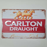 Vintage-style Carlton Draught sign with horses and red background