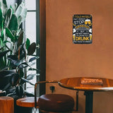 Decorative sign on a wall with a bar setting, including a table and plants.