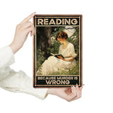 Person holding a sign with a vintage-style illustration of a woman reading and text 'Reading because murder is wrong'.