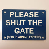Please Shut the Gate Dog Planning Escape Sign Plaque in Blue with White Engraving