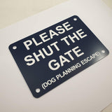 Please Shut the Gate Dog Planning Escape Sign Plaque in Navy Blue with White Engraving